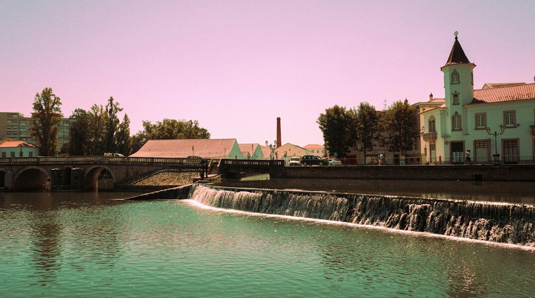Industrial pipe discharging water into a river in Portugal